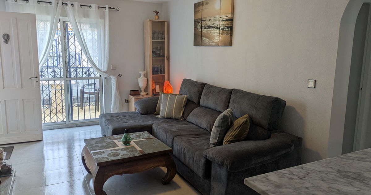 Living room with open plan kitchen